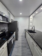 1120 Parkside Green Dr in Greenacres, FL - Building Photo - Building Photo