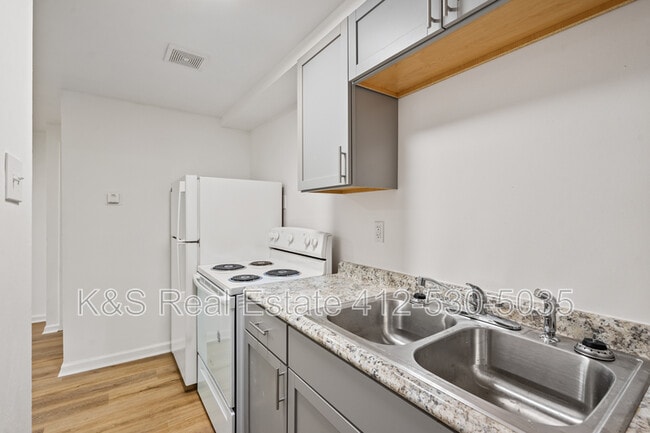 property at 441-443-445 Library St