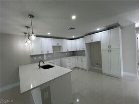 405-407 Chalet Ave S in Lehigh Acres, FL - Building Photo