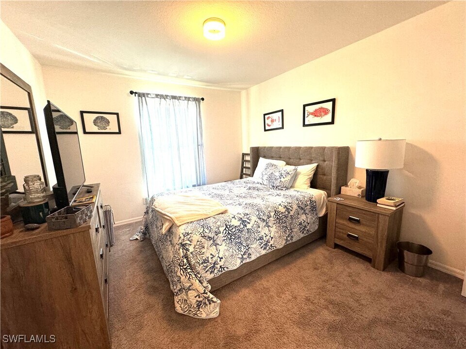 7790 Woodbrook Cir in Naples, FL - Building Photo