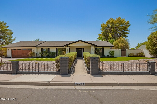 property at 5621 E Sweetwater Ave
