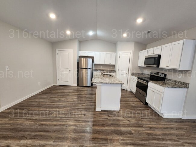 property at 1921 E 69th Ct N