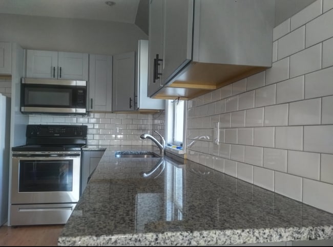 117 W 14th St in Davenport, IA - Foto de edificio - Building Photo