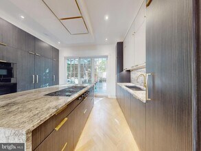 1808 Riggs Pl NW, Unit AR-4A518 in Washington, DC - Building Photo - Building Photo