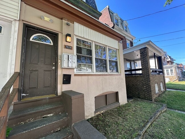 property at 7028 Paschall Ave