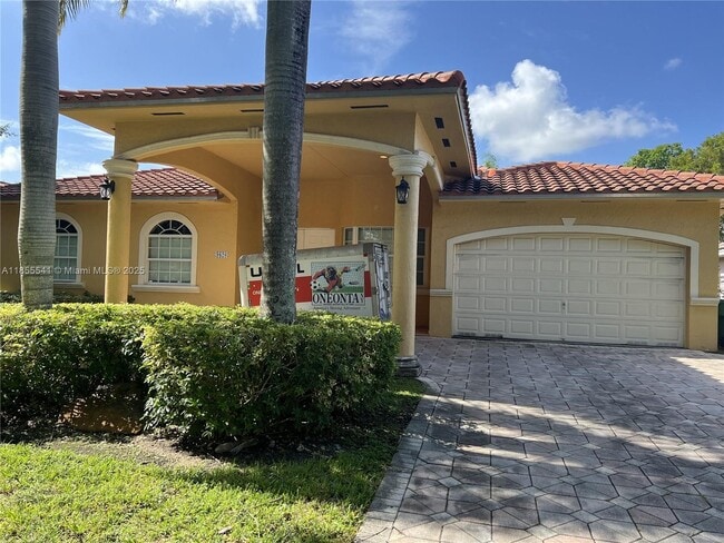 property at 9820 NW 26th St