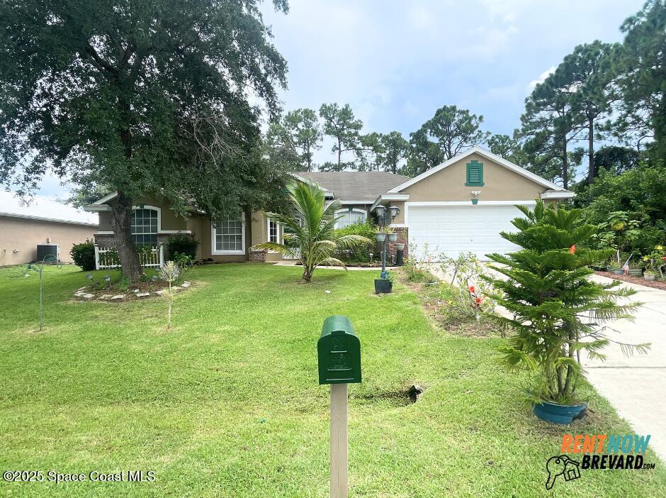 450 Scodella St SW in Palm Bay, FL - Building Photo