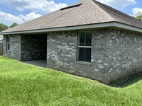 10601 Roundhill Dr in Gulfport, MS - Foto de edificio - Building Photo