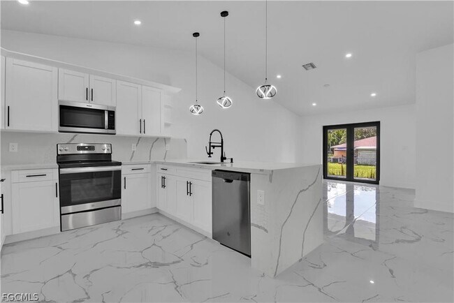 property at 4921 Leonard Blvd S