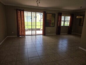 1250 Clove Dr in Poinciana, FL - Building Photo - Building Photo