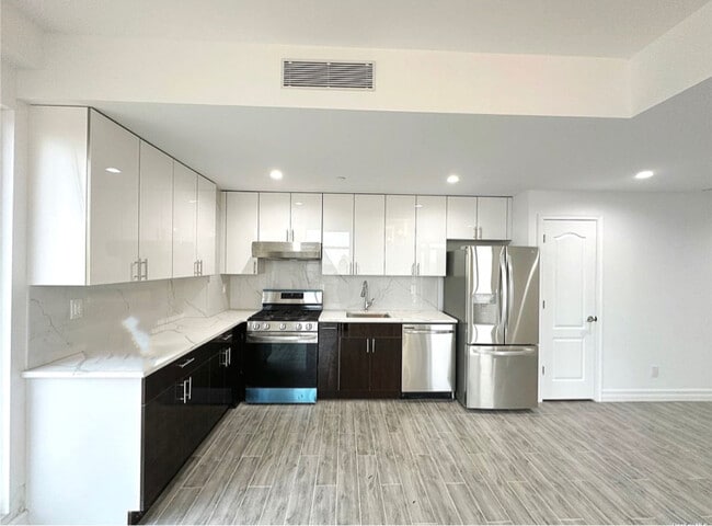 property at 65-18 Austin St
