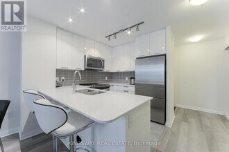 5033-5033 Four Springs Ave in Mississauga, ON - Building Photo - Building Photo