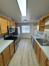 1540 S Bellaire St, Unit V153 in Denver, CO - Foto de edificio - Building Photo