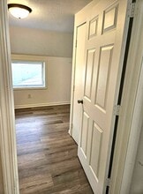 107 Esterly St, Unit 2nd Floor Duplex in East Jordan, MI - Building Photo - Building Photo