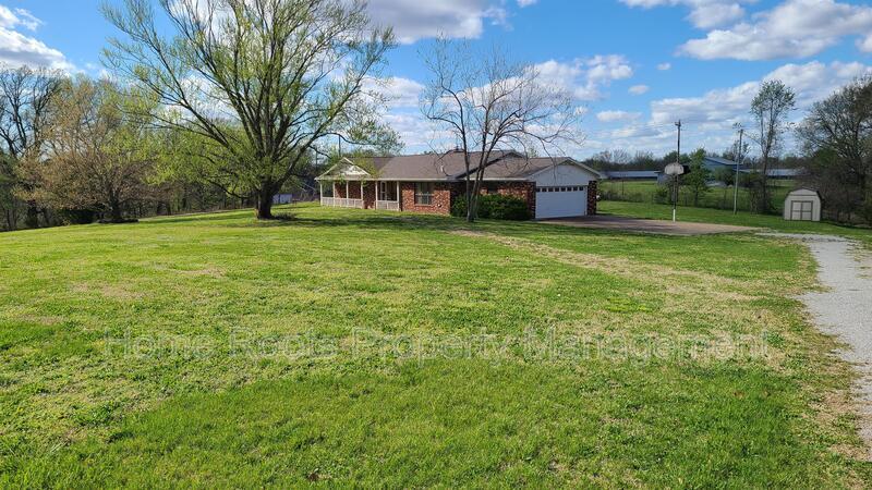 14256 Hatcher Hollow Rd in Gravette, AR - Building Photo