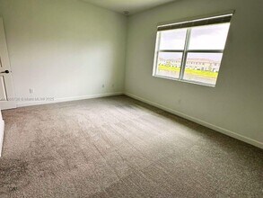 542 Rivergrass St in Port St. Lucie, FL - Building Photo - Building Photo