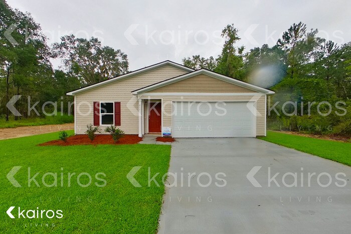 211 Lake Pamona Rd in Midway, GA - Building Photo