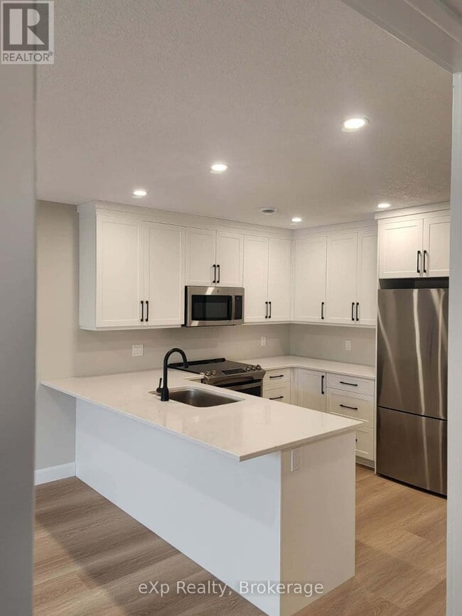 12 Malcolm Cres in North Perth, ON - Building Photo - Building Photo