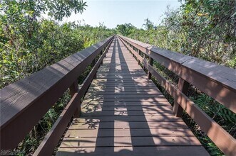 15405 Cedarwood Ln in Naples, FL - Building Photo - Building Photo