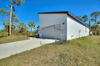 1220 Papillon St in North Port, FL - Building Photo - Building Photo