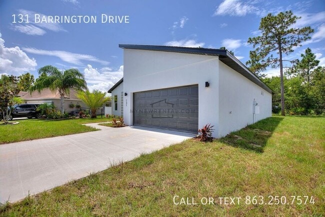 131 Barrington Dr in Poinciana, FL - Foto de edificio - Building Photo