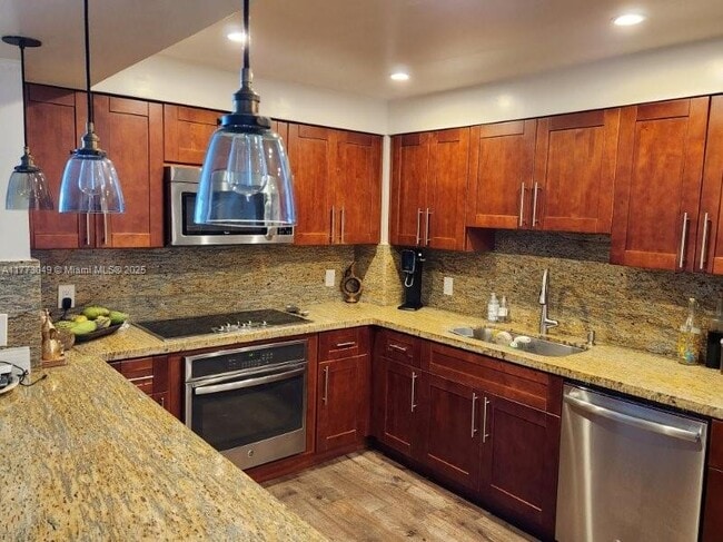 property at 5825 Collins Ave