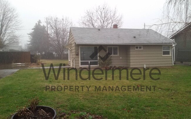property at 124 NE Ash Ave