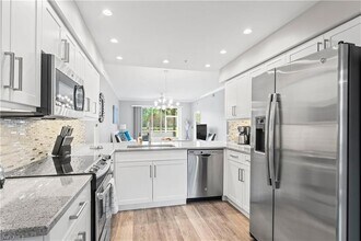 8420 Naples Heritage Dr in Naples, FL - Foto de edificio - Building Photo