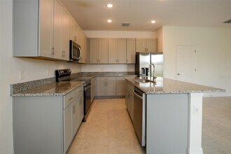 1669 Way of Peace Ln in Mascotte, FL - Building Photo - Building Photo
