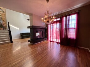 610 Clarendon Loop in Castle Pines, CO - Building Photo - Building Photo
