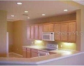 8406 Wethersfield Run, Unit 104 in Lakewood Ranch, FL - Foto de edificio - Building Photo