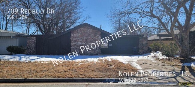 property at 709 Redbud Dr