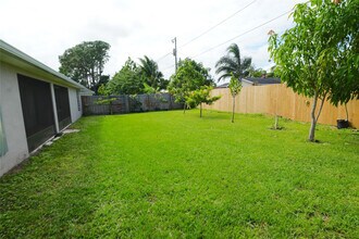 2112 SE Holland St in Port St. Lucie, FL - Building Photo - Building Photo