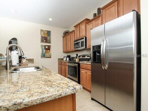 8938 Majesty Palm Rd in Kissimmee, FL - Building Photo - Building Photo