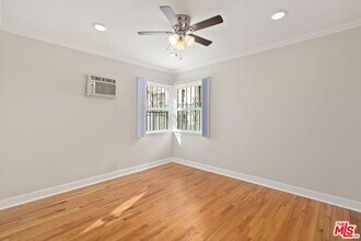 827 N Alta Vista Blvd in Los Angeles, CA - Building Photo - Building Photo