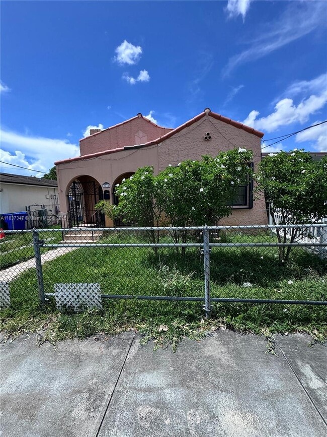 property at 3444 NW 4th St