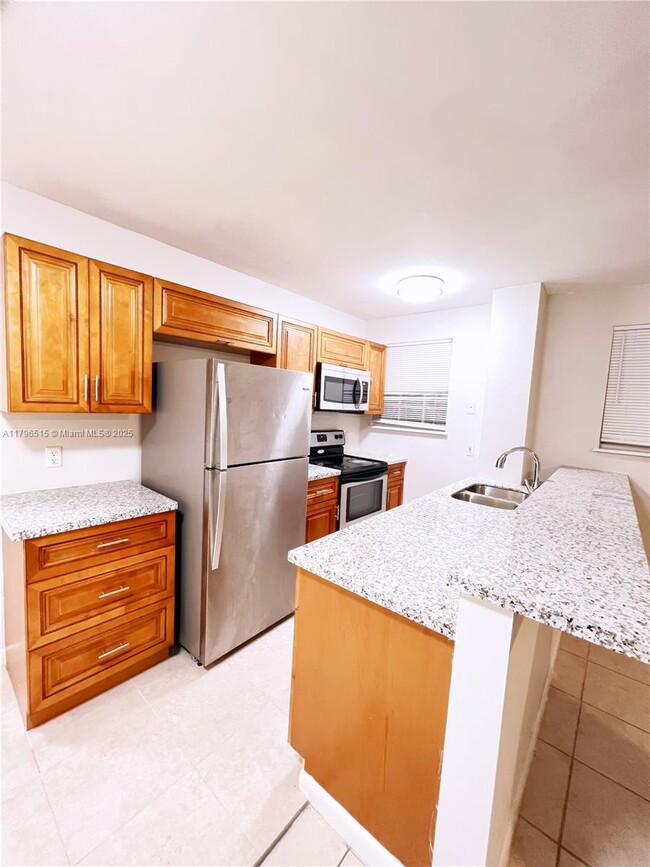property at 14220 NW 22nd Ave