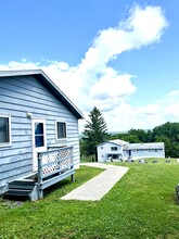 Country Gardens Apartments in Freeville, NY - Foto de edificio - Building Photo