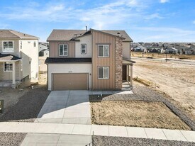 12659 Enclave Scenic Dr, Unit 1414 in Peyton, CO - Building Photo