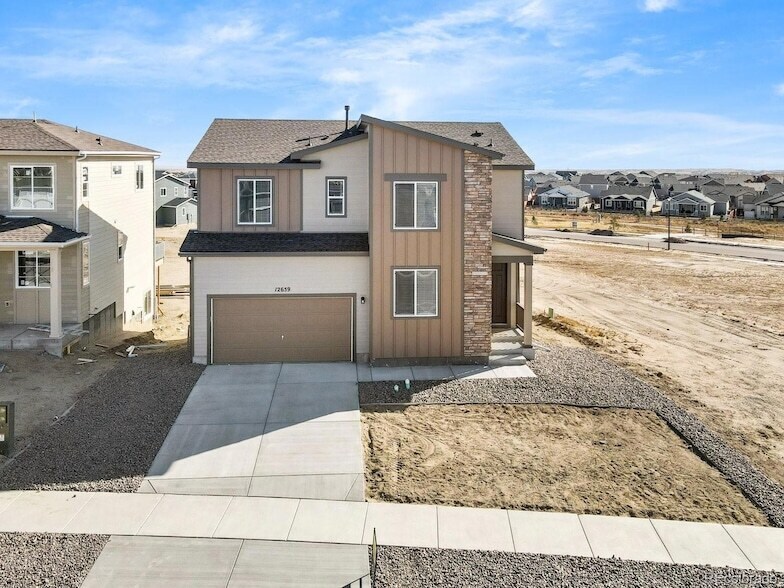 12659 Enclave Scenic Dr, Unit 1414 in Peyton, CO - Building Photo