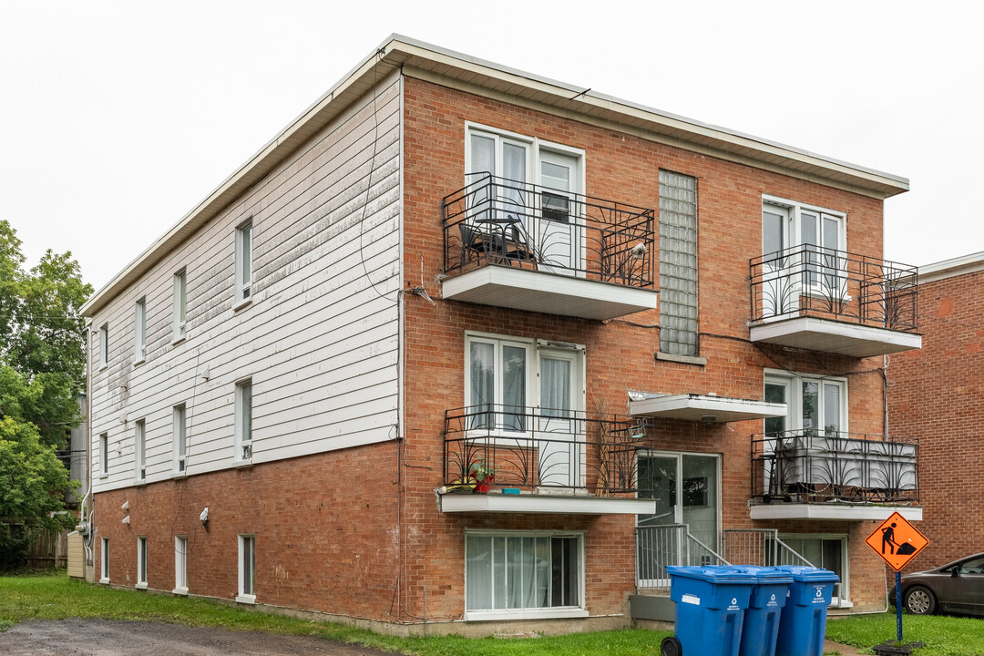 340 De La Sapinière-Dorion Rue E in Québec, QC - Building Photo