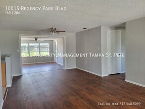 10015 Regency Park Blvd in Port Richey, FL - Building Photo - Building Photo