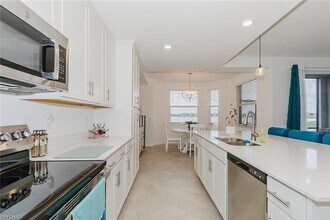 5629 Double Eagle Cir in Ave Maria, FL - Foto de edificio - Building Photo