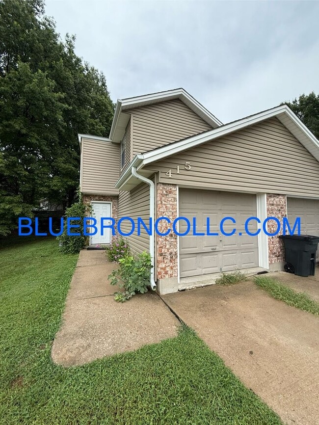 property at 415 NE Churchill St