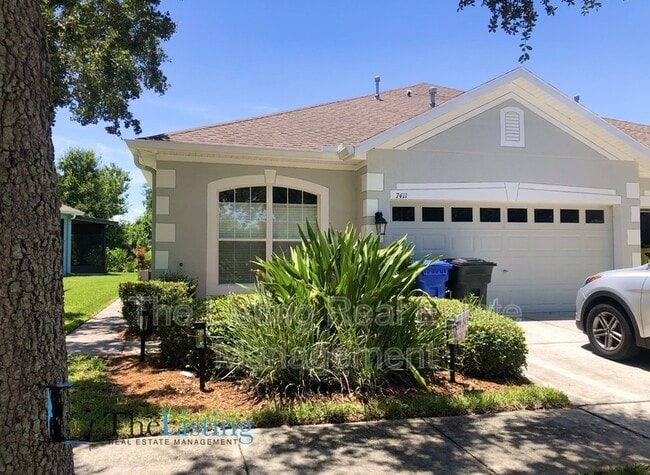 property at 7411 Surrey Wood Ln
