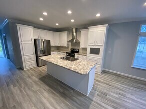 80 John F Kennedy St in Dunedin, FL - Foto de edificio - Building Photo