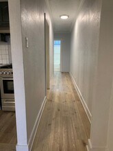 1234-1236 Rolland Curtis Pl in Los Angeles, CA - Building Photo - Building Photo