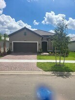 9935 SW Cloister Dr, Unit 09-907 in Port St. Lucie, FL - Building Photo