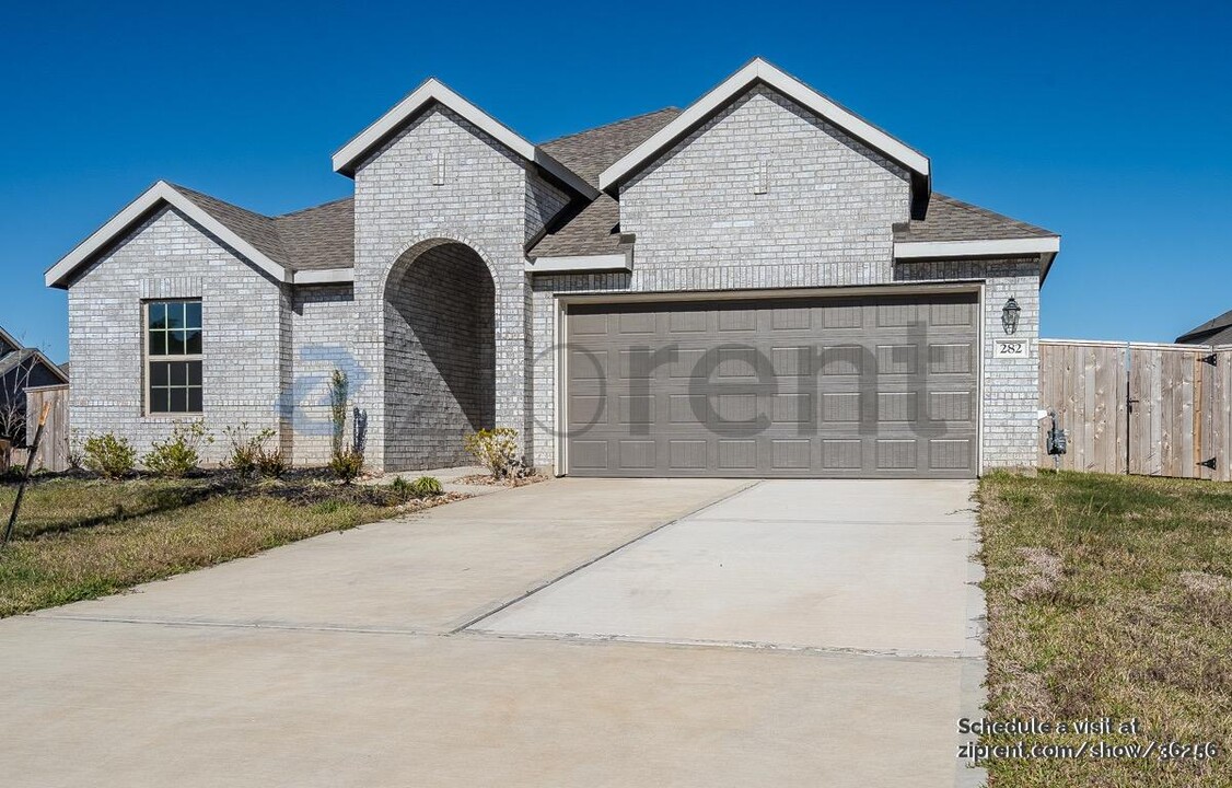 282 Mountain Knls Ln in Willis, TX - Building Photo