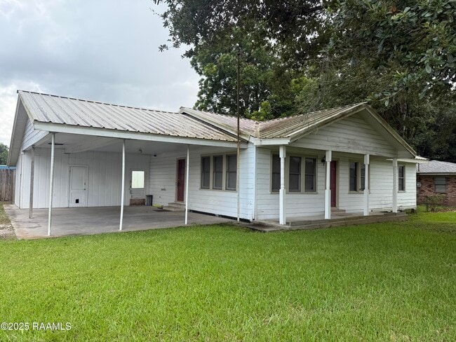 property at 129 E Broussard Rd